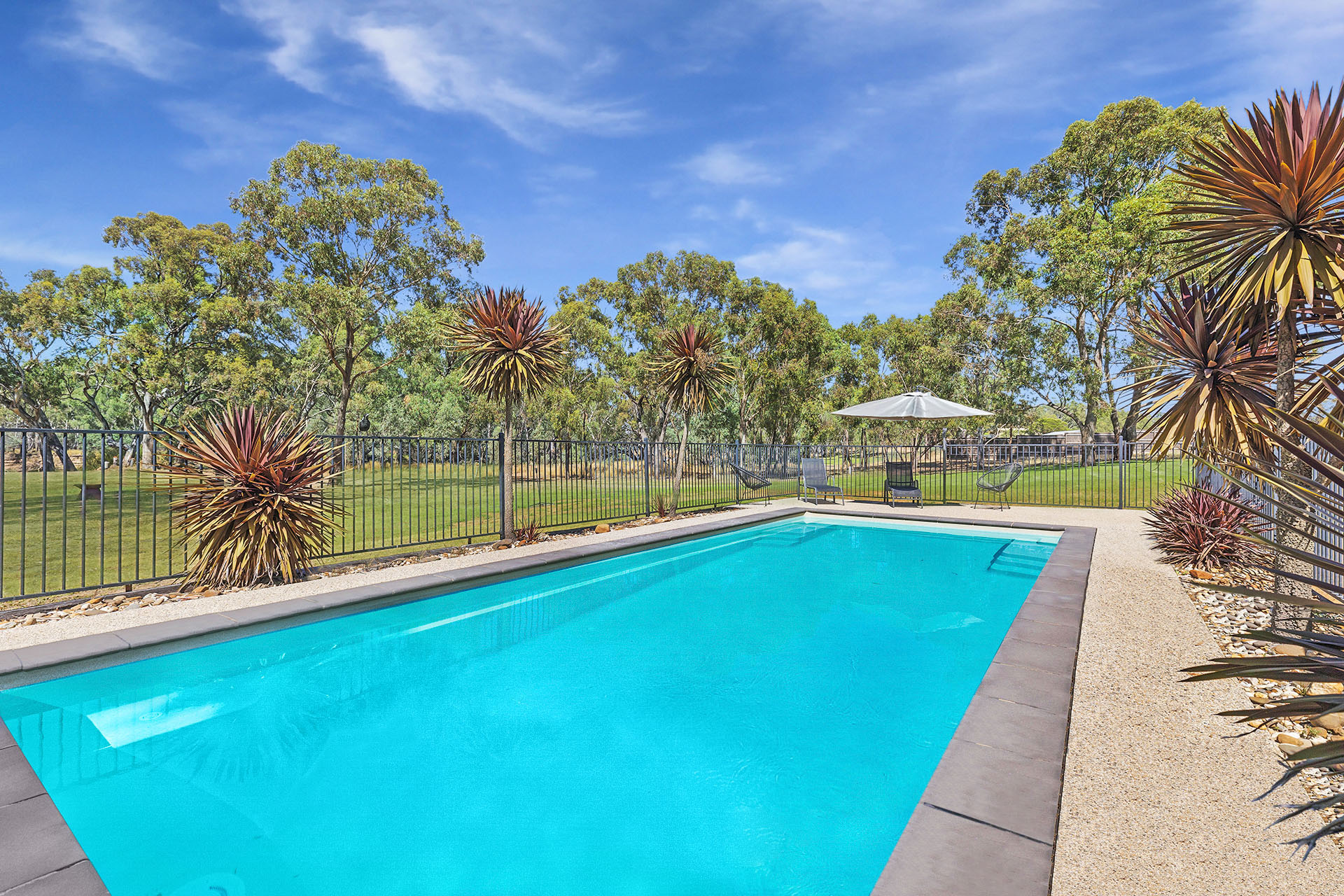 Pool image with straigtened umbrella